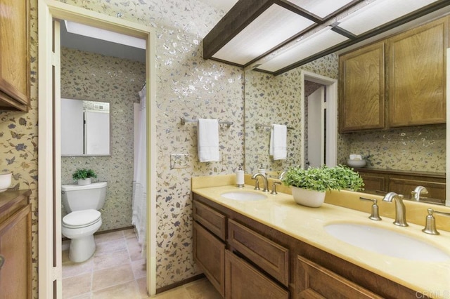 5420 Mirar Ct, Bonita, CA 91902 - bathroom featuring double vanity and wallpapered walls