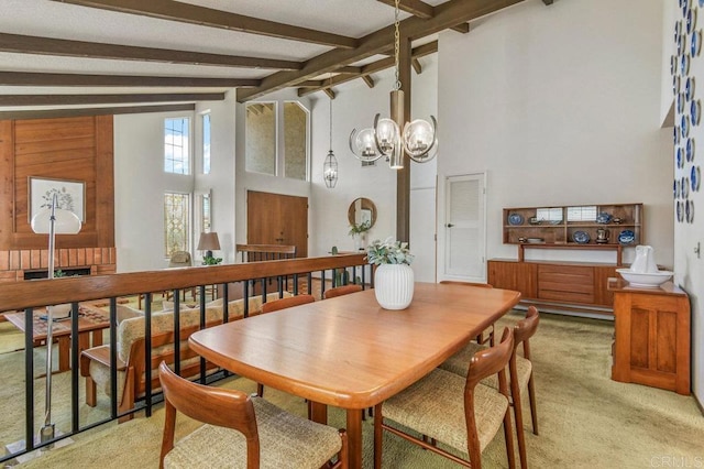 5420 Mirar Ct, Bonita, CA 91902 - dining area with high vaulted ceiling, light carpet, beamed ceiling, and a chandelier