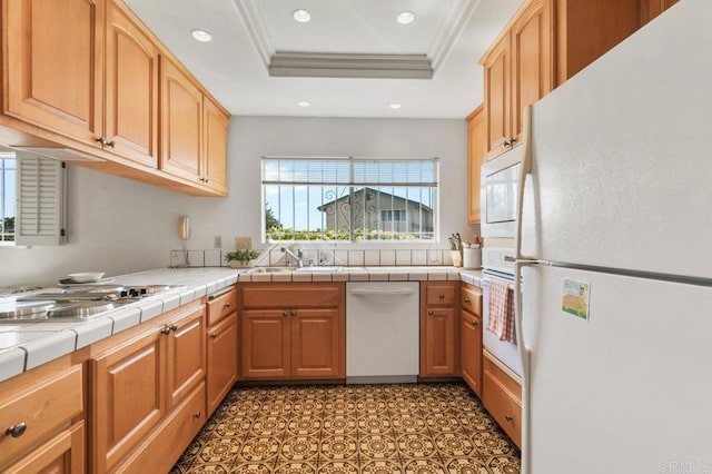 5420 Mirar Ct, Bonita, CA 91902 - kitchen featuring white appliances, recessed lighting, a raised ceiling, ornamental molding, and tile countertops