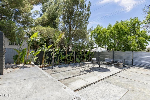 10609 Fernglen Ave, Tujunga, CA 91042 - fenced backyard with a patio and an outdoor hangout area