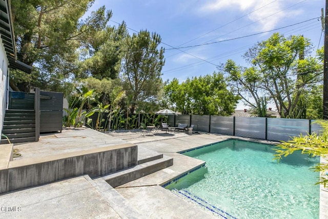 10609 Fernglen Ave, Tujunga, CA 91042 - view of swimming pool featuring a patio area and a fenced backyard