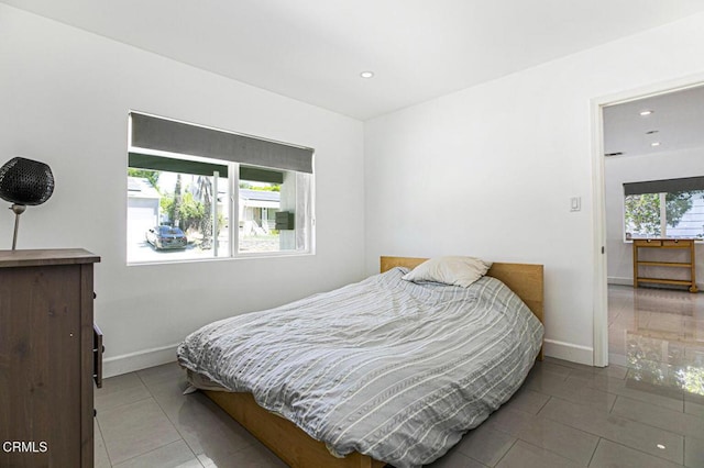 10609 Fernglen Ave, Tujunga, CA 91042 - tiled bedroom featuring baseboards and recessed lighting