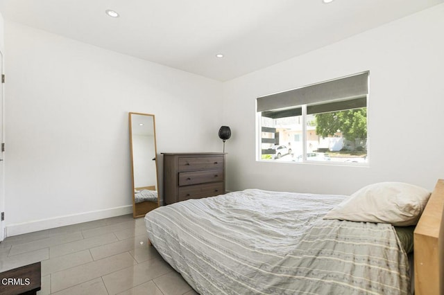 10609 Fernglen Ave, Tujunga, CA 91042 - tiled bedroom featuring recessed lighting and baseboards