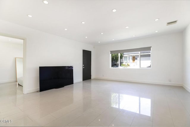 10609 Fernglen Ave, Tujunga, CA 91042 - empty room with recessed lighting and light tile patterned flooring