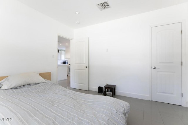 10609 Fernglen Ave, Tujunga, CA 91042 - bedroom with light tile patterned floors and recessed lighting