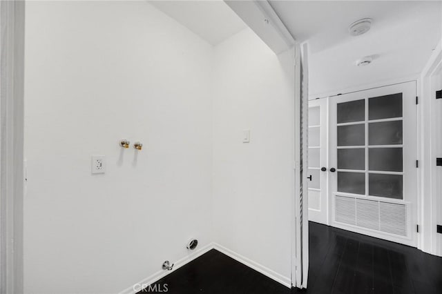 11601 Montana Ave Unit 7, Los Angeles, CA 90049 - laundry room with hookup for a gas dryer and dark wood-type flooring