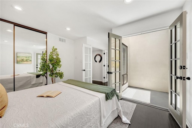 11601 Montana Ave Unit 7, Los Angeles, CA 90049 - bedroom with french doors, wood finished floors, recessed lighting, and multiple windows