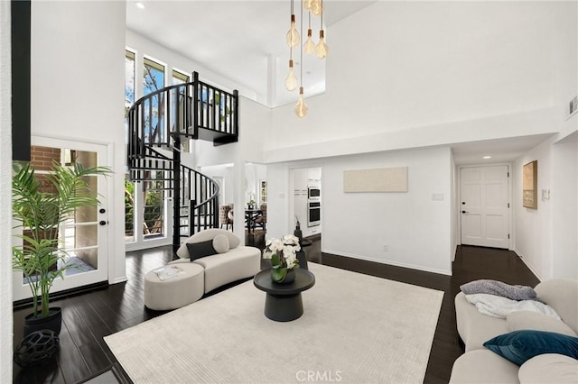 11601 Montana Ave Unit 7, Los Angeles, CA 90049 - living area with stairs, dark wood-style floors, a high ceiling, and recessed lighting