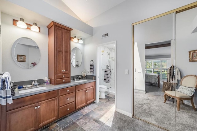 4843 Flying Cloud Way, Carlsbad, CA 92008 - bathroom with lofted ceiling, double vanity, a shower stall, and connected bathroom