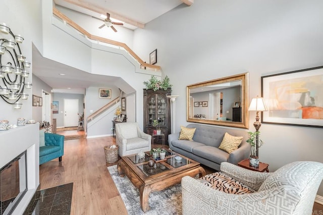 4843 Flying Cloud Way, Carlsbad, CA 92008 - living room featuring stairs, high vaulted ceiling, ceiling fan, and wood finished floors
