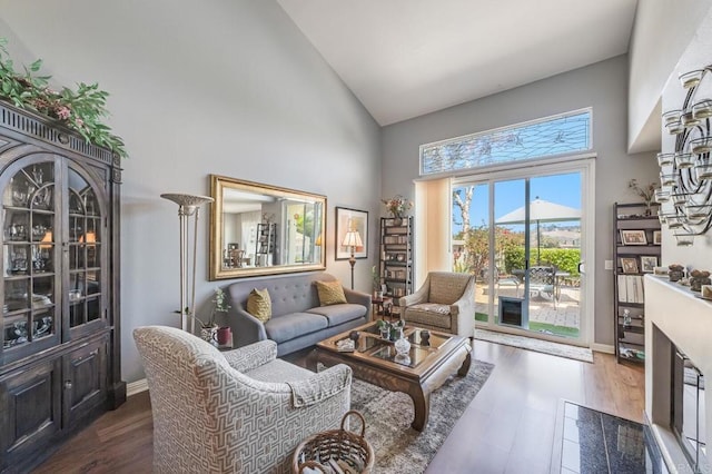 4843 Flying Cloud Way, Carlsbad, CA 92008 - living room featuring high vaulted ceiling and wood finished floors