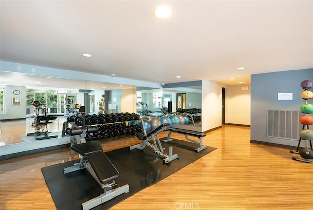 411 W Seaside Way Unit 402, Long Beach, CA 90802 - exercise room featuring wood finished floors and recessed lighting