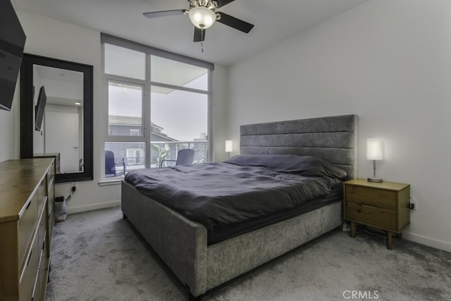 411 W Seaside Way Unit 402, Long Beach, CA 90802 - carpeted bedroom featuring baseboards and ceiling fan