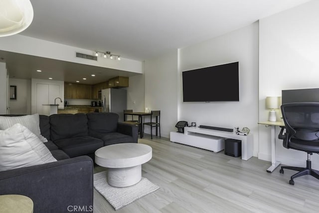 411 W Seaside Way Unit 402, Long Beach, CA 90802 - living room with light wood-style floors