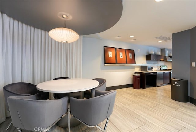 411 W Seaside Way Unit 402, Long Beach, CA 90802 - dining room featuring baseboards