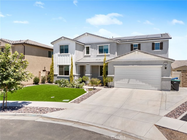 32886 Birchall Ct, Winchester, CA 92596 - view of front of property featuring roof mounted solar panels, concrete driveway, a front yard, stucco siding, and an attached garage