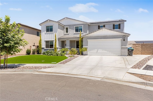 32886 Birchall Ct, Winchester, CA 92596 - traditional home with roof mounted solar panels, a front yard, an attached garage, driveway, and stucco siding