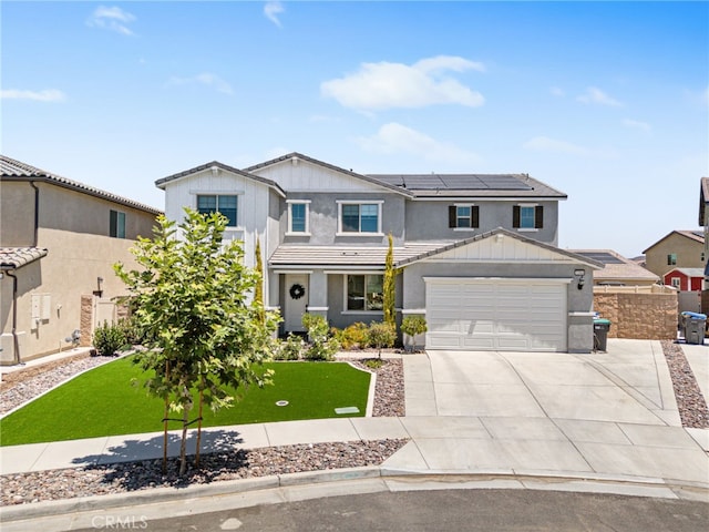 32886 Birchall Ct, Winchester, CA 92596 - view of front of property with driveway, roof mounted solar panels, an attached garage, and stucco siding