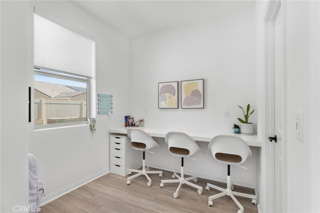 32886 Birchall Ct, Winchester, CA 92596 - office area with light wood-type flooring and built in study area