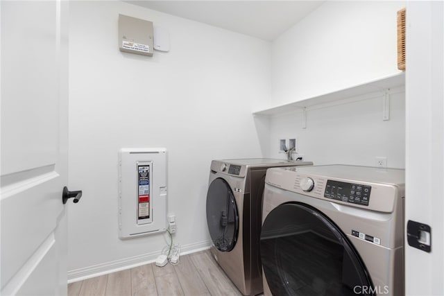 32886 Birchall Ct, Winchester, CA 92596 - laundry area featuring separate washer and dryer and light wood-type flooring
