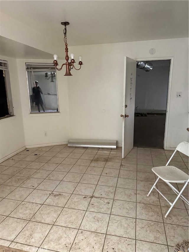 41111 172nd St E, Lancaster, CA 93535 - unfurnished dining area with a chandelier and light tile patterned floors