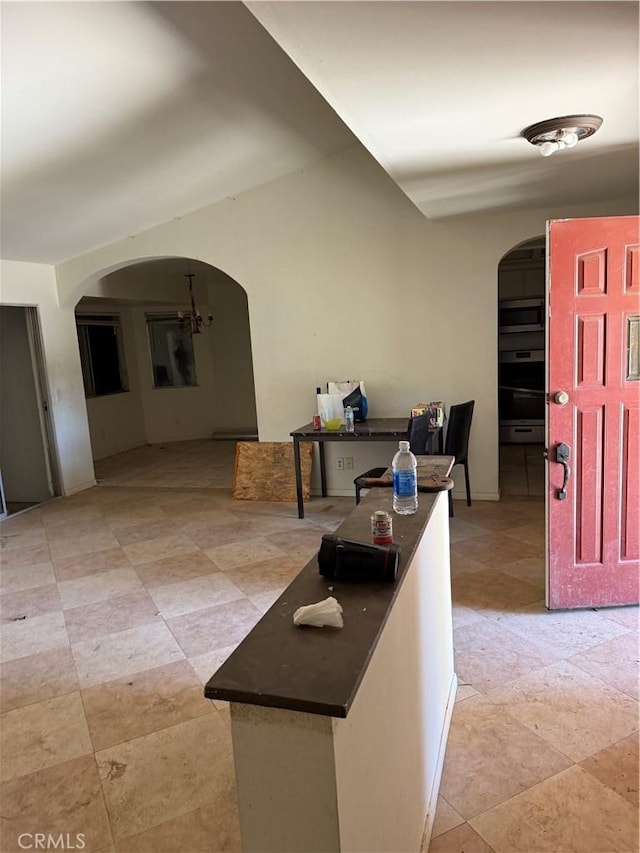 41111 172nd St E, Lancaster, CA 93535 - foyer featuring arched walkways and light tile patterned floors