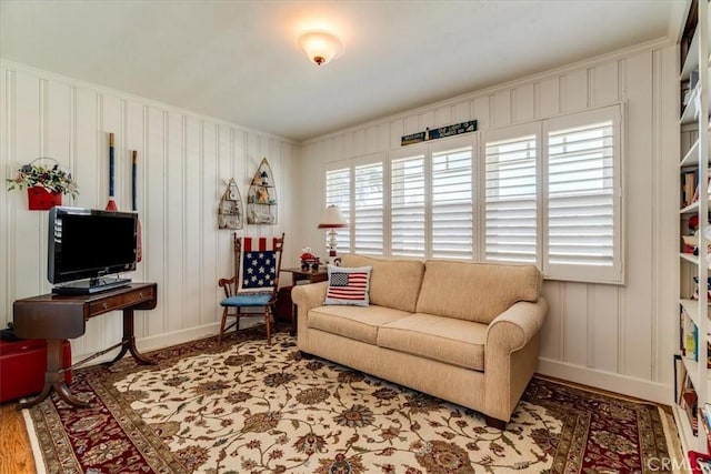 923 Farroll Ave, Arroyo Grande, CA 93420 - living area featuring a decorative wall, wood finished floors, and ornamental molding