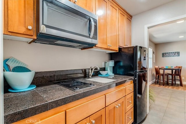 923 Farroll Ave, Arroyo Grande, CA 93420 - kitchen with black appliances, tile counters, light tile patterned flooring, and recessed lighting