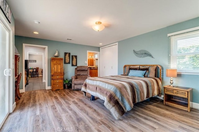 923 Farroll Ave, Arroyo Grande, CA 93420 - bedroom featuring wood finished floors, recessed lighting, and connected bathroom