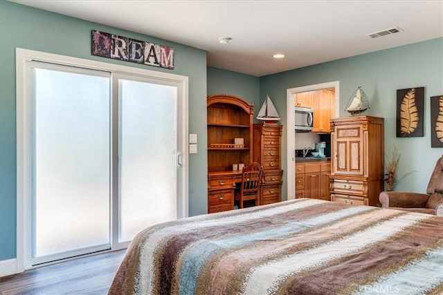 923 Farroll Ave, Arroyo Grande, CA 93420 - bedroom featuring access to outside, wood finished floors, and recessed lighting