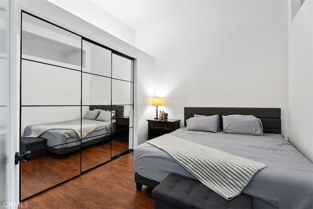 1046 Calle Del Cerro Unit 408, San Clemente, CA 92672 - bedroom featuring wood finished floors and a closet