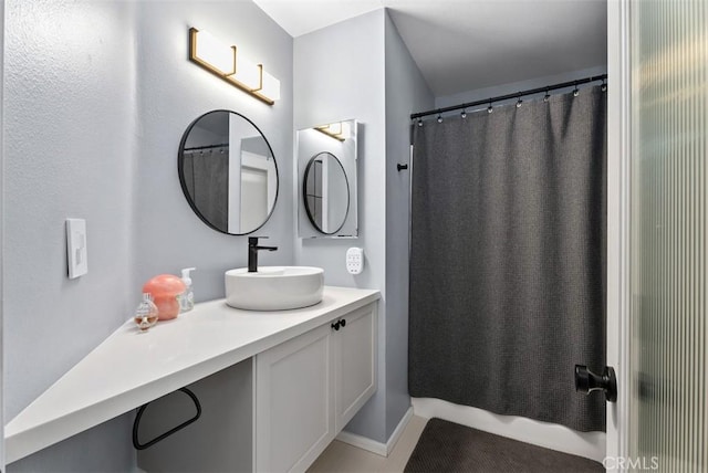 1046 Calle Del Cerro Unit 408, San Clemente, CA 92672 - bathroom featuring vanity and baseboards