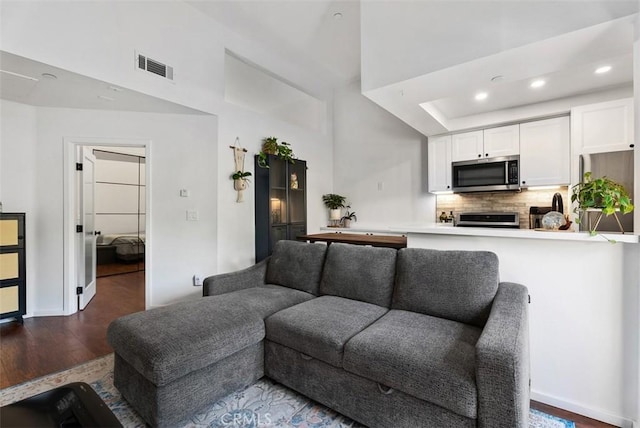 1046 Calle Del Cerro Unit 408, San Clemente, CA 92672 - living room with wood finished floors and recessed lighting