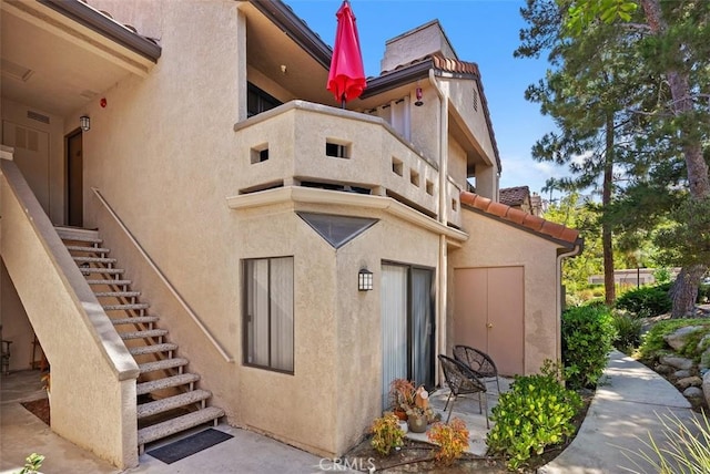 1046 Calle Del Cerro Unit 408, San Clemente, CA 92672 - view of building exterior featuring stairs