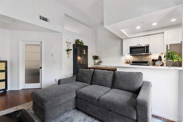 1046 Calle Del Cerro Unit 408, San Clemente, CA 92672 - living room with wood finished floors and recessed lighting