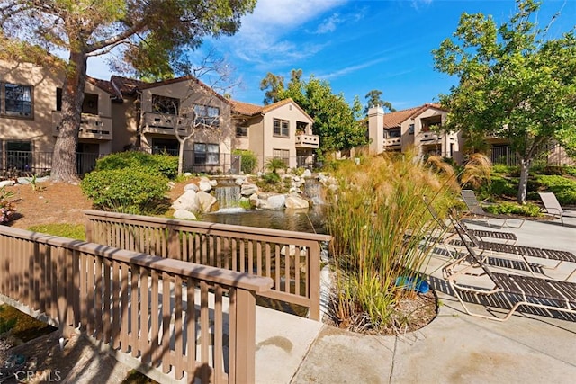 1046 Calle Del Cerro Unit 408, San Clemente, CA 92672 - view of property's community with a residential view and a patio area
