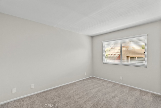 17910 River Cir Unit 5, Canyon Country, CA 91387 - empty room with light colored carpet and baseboards