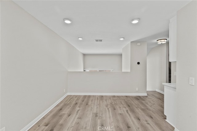 17910 River Cir Unit 5, Canyon Country, CA 91387 - spare room with wood finished floors and recessed lighting