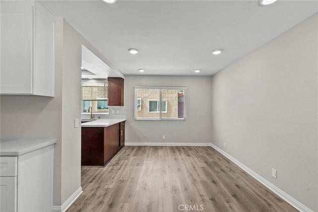 17910 River Cir Unit 5, Canyon Country, CA 91387 - kitchen featuring light wood finished floors, light countertops, and recessed lighting