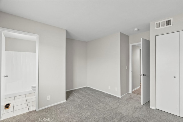 17910 River Cir Unit 5, Canyon Country, CA 91387 - unfurnished bedroom featuring carpet, connected bathroom, and a closet