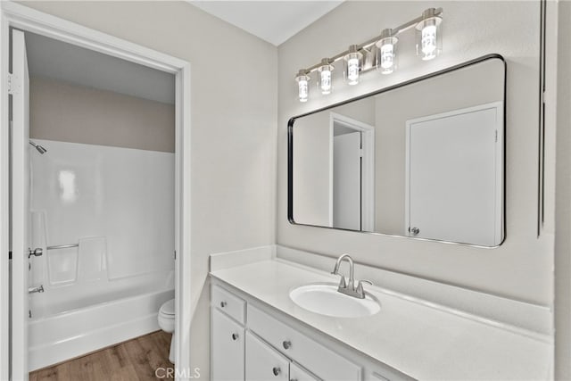 17910 River Cir Unit 5, Canyon Country, CA 91387 - bathroom with vanity, wood finished floors, and washtub / shower combination
