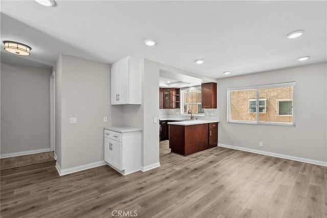 17910 River Cir Unit 5, Canyon Country, CA 91387 - kitchen featuring light countertops, light wood-style floors, white cabinetry, and recessed lighting