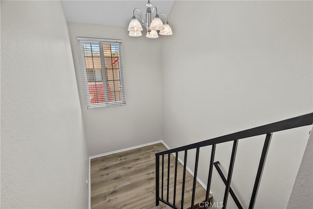 17910 River Cir Unit 5, Canyon Country, CA 91387 - stairs featuring a chandelier and wood finished floors