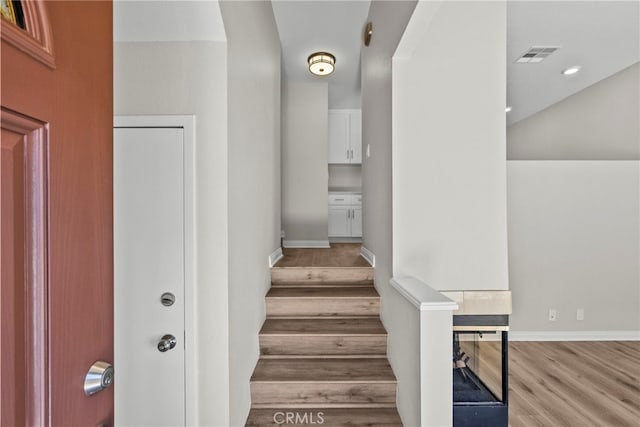 17910 River Cir Unit 5, Canyon Country, CA 91387 - stairway with wood finished floors and baseboards