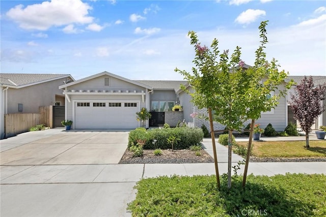 1938 N Frontier St, Hanford, CA 93230 - ranch-style home featuring concrete driveway and a garage