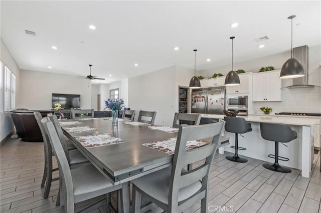 1938 N Frontier St, Hanford, CA 93230 - dining space featuring plenty of natural light, a ceiling fan, recessed lighting, and light wood-type flooring
