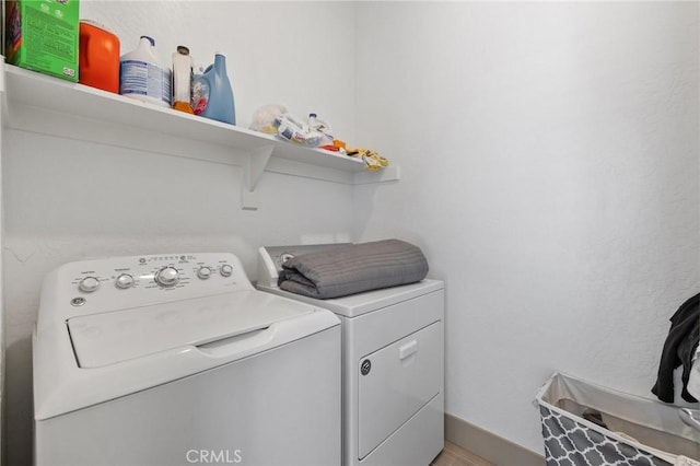 1938 N Frontier St, Hanford, CA 93230 - laundry area featuring washer and dryer and baseboards