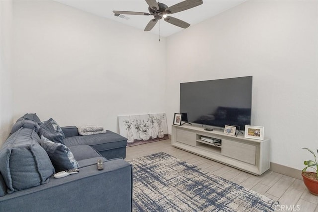 1938 N Frontier St, Hanford, CA 93230 - living area with ceiling fan and wood finished floors