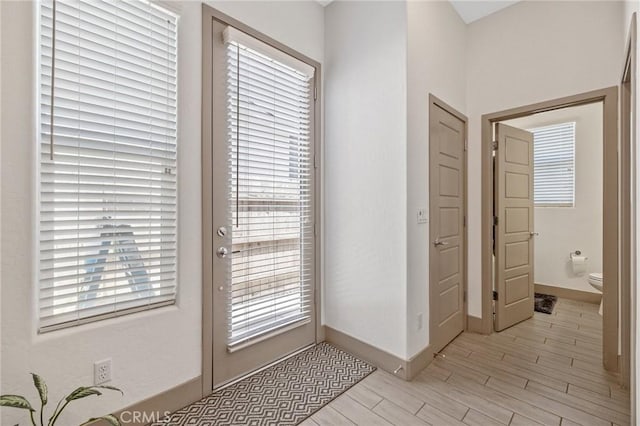 1938 N Frontier St, Hanford, CA 93230 - entryway with light wood-type flooring and baseboards