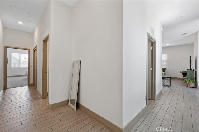 1938 N Frontier St, Hanford, CA 93230 - corridor featuring wood tiled floors and recessed lighting